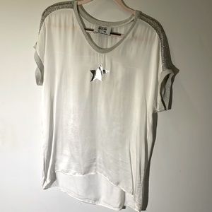 White light weight T. Silver embellishments. Size M